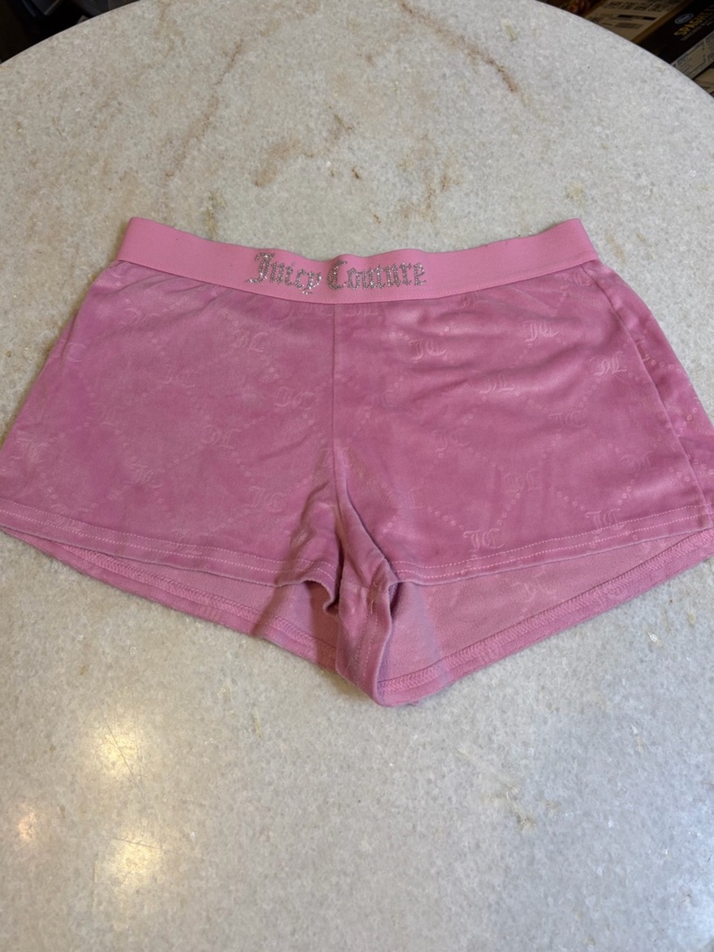 Pink Juicy Couture shorts with rhinestone logo